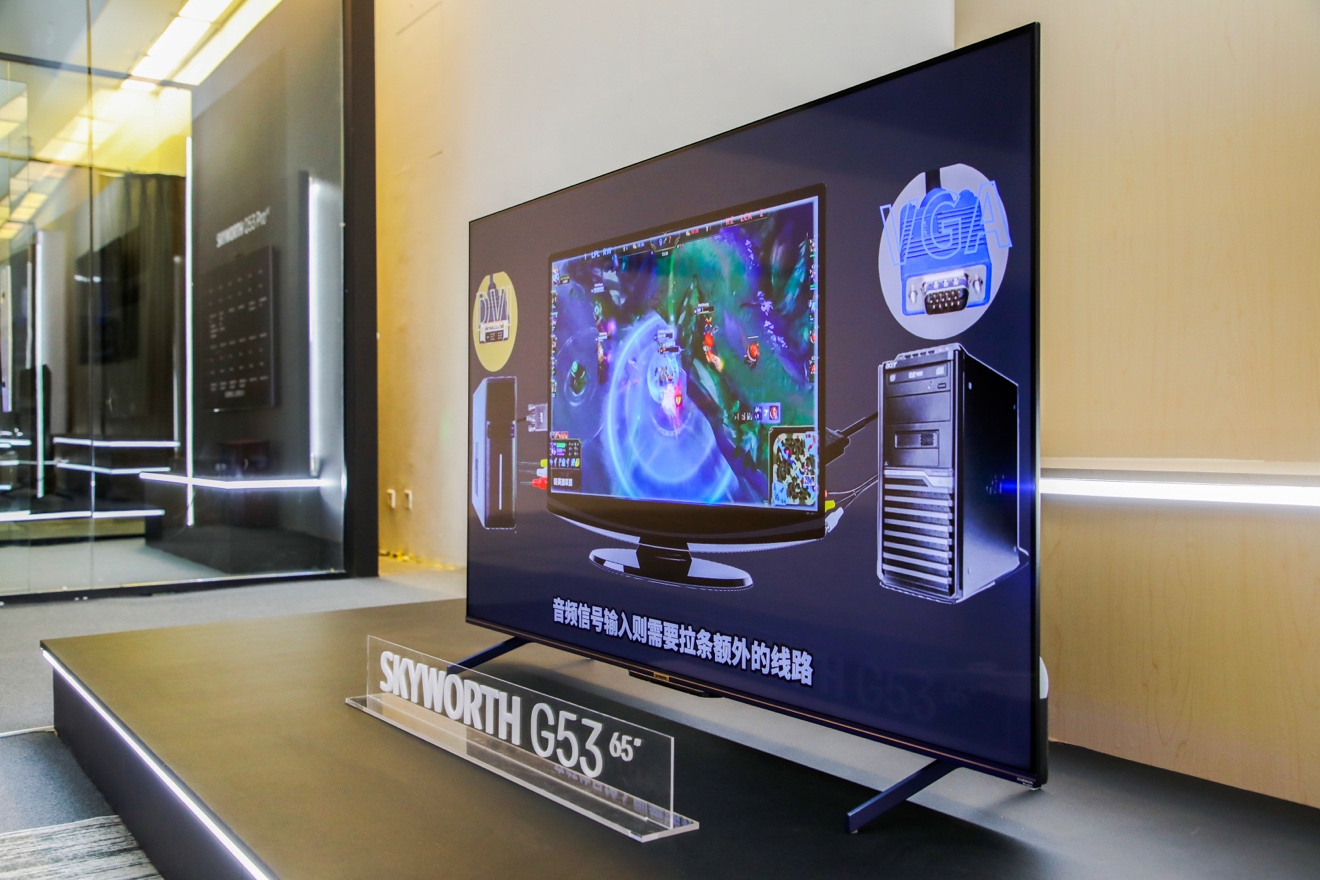 桌子上放着电视

描述已自动生成